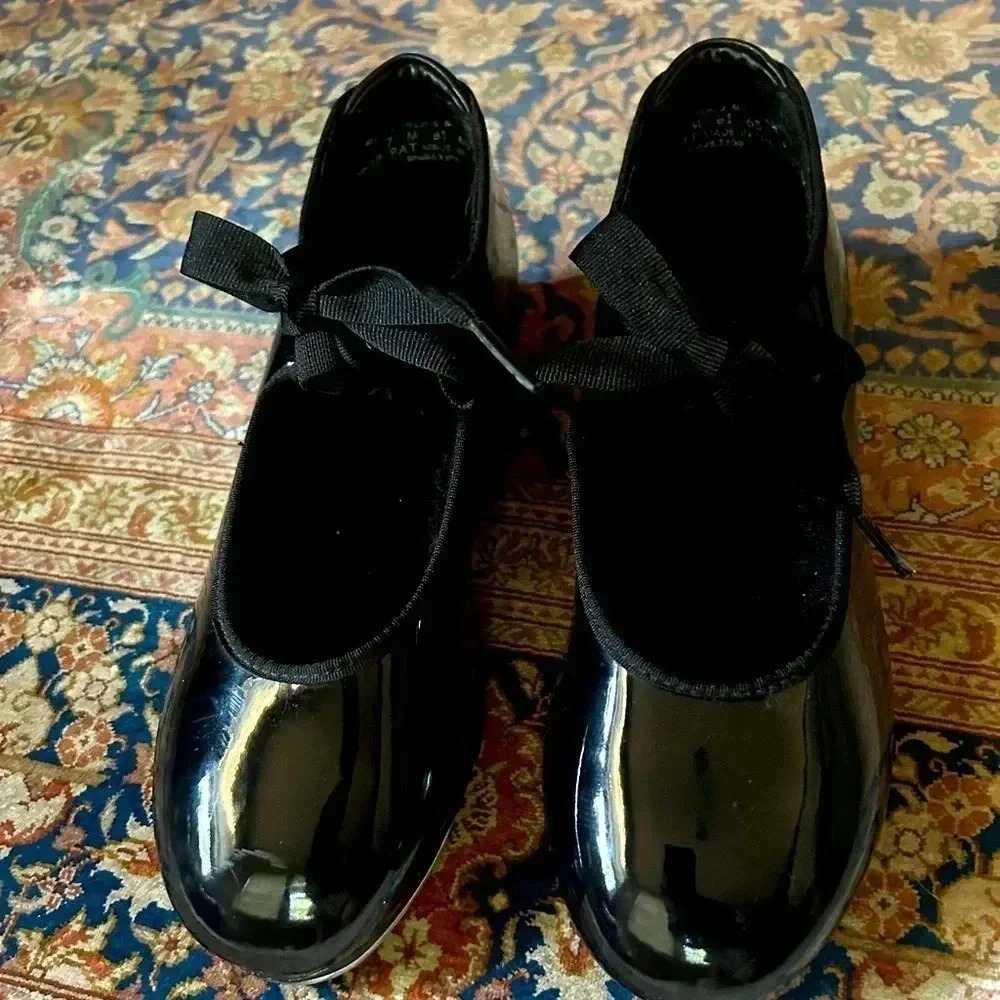 Like new Capezio tap shoes. Worn a few times to finish out the tap season.W5, M7